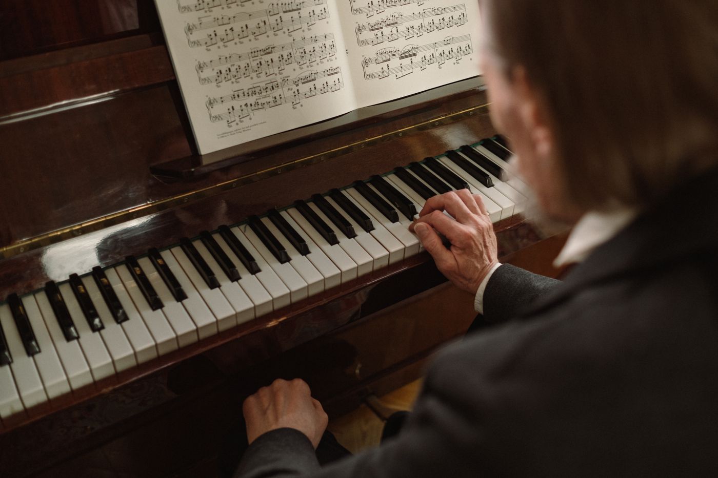 A pianist playing from sheet music
