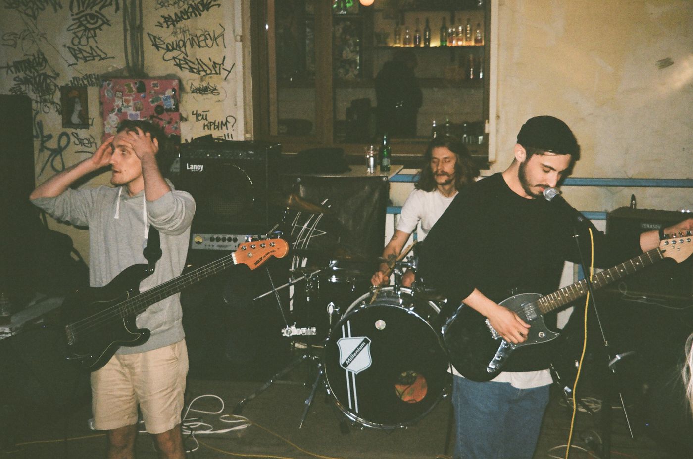 A band performing together at a small venue