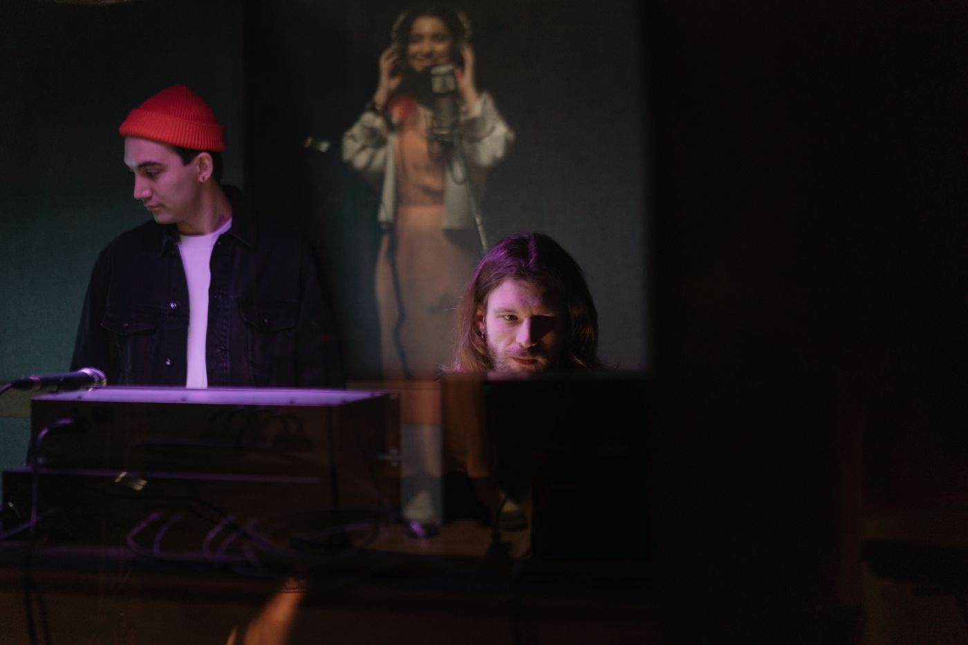 Musicians collaborating on a studio recording